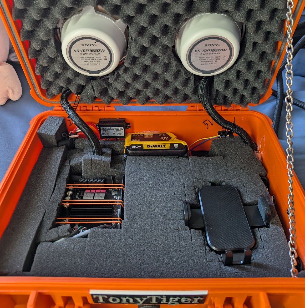 Open case of the custom battery-powered waterproof Bluetooth speaker